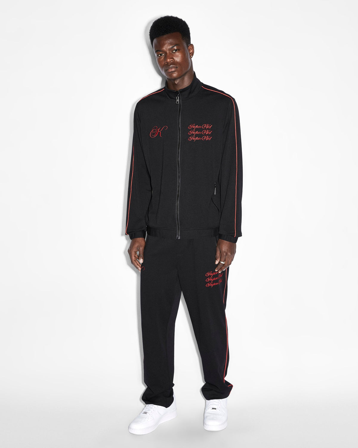 Mens Scripted Synthesis Pant Black/red Relaxed Tapered Pants - Black